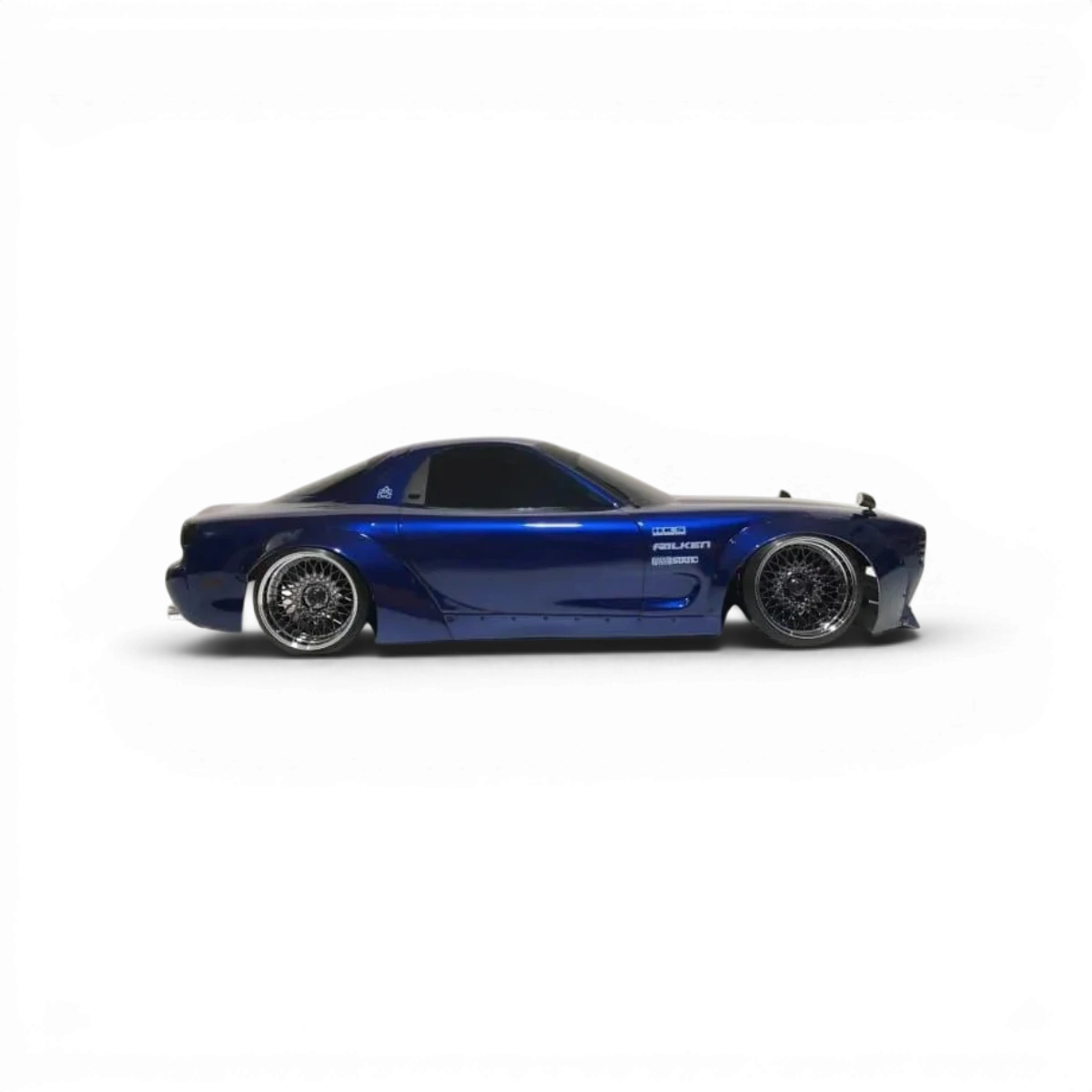 Carrosserie Mazda RX7 FD3s Boss pour voiture RC, modèle Aplastics RC, en plastique noir avec détails réalistes.
