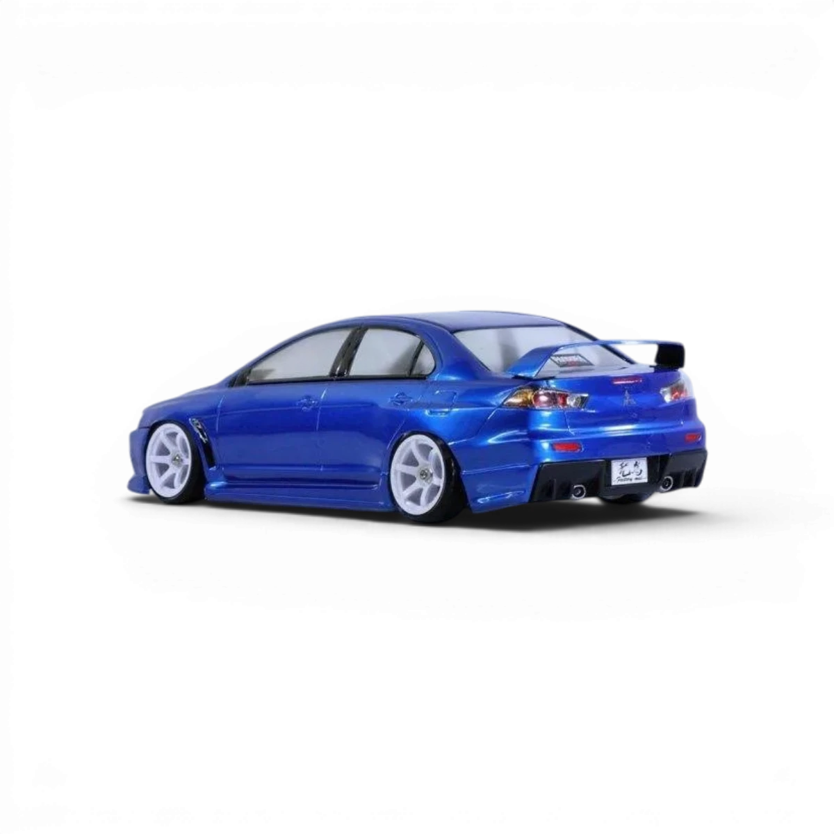 Carrosserie Mitsubishi Lancer Evo X Pandora RC pour modèle radiocommandé, avec détails de finition et design réaliste.