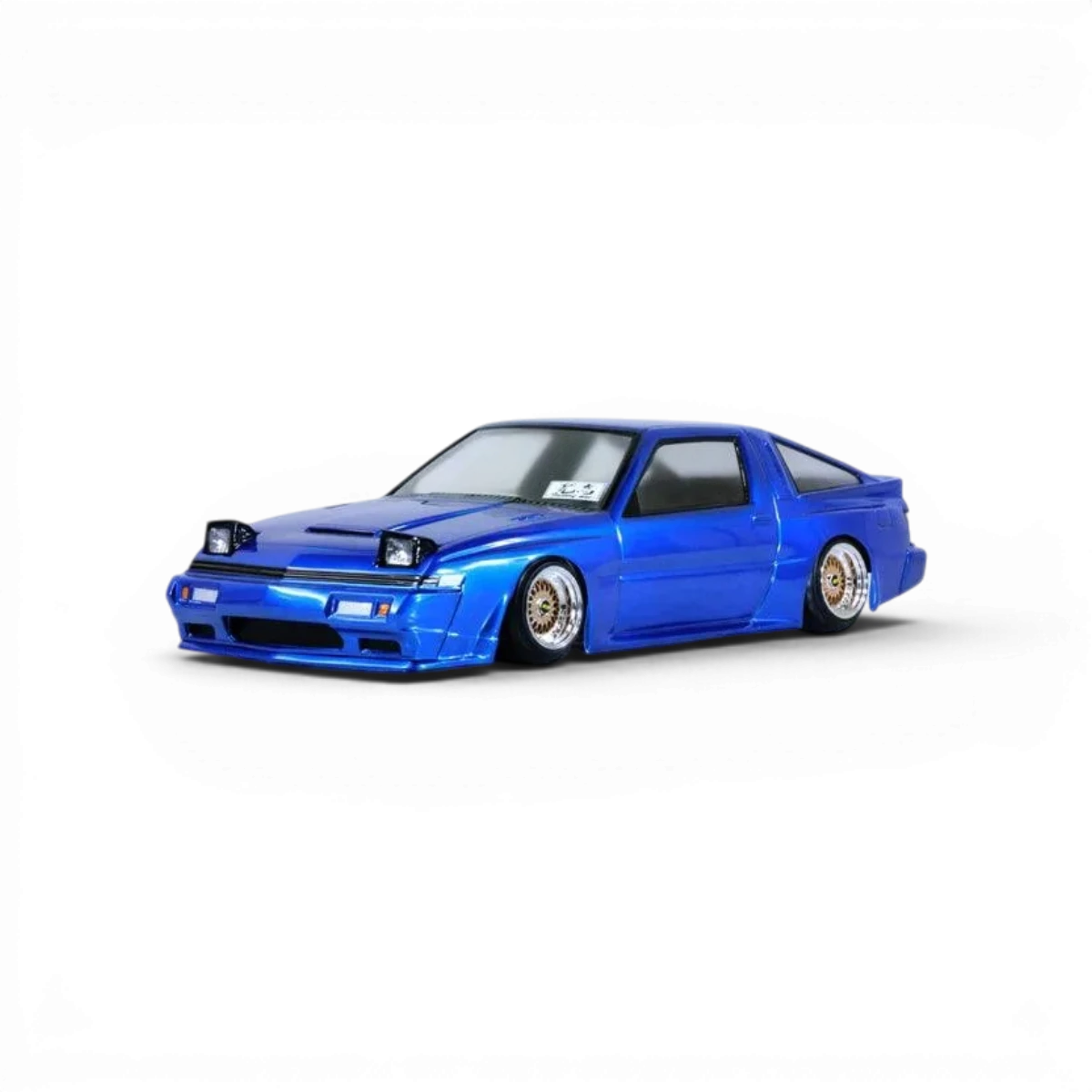 Carrosserie Pandora RC Mitsubishi STARION pour modèle de voiture télécommandée, en détail avec finition réaliste et design élégant.