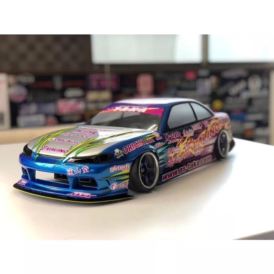 Voiture Nissan Silvia S14.5 modifiée Naoki Nakamura, customisation par PS-Taka, vue de côté avec détails de la carrosserie.