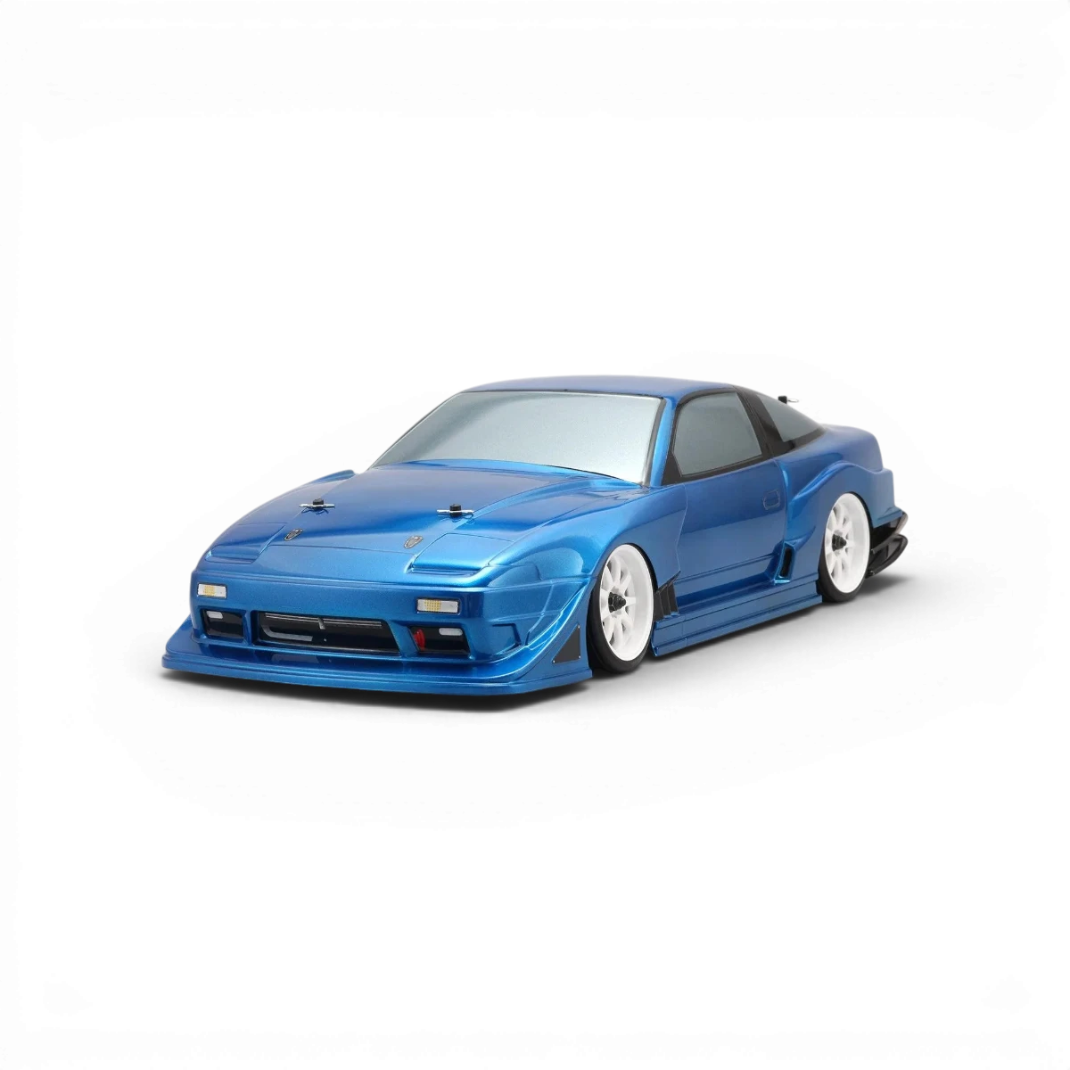 Carrosserie Nissan 180SX GP Sports pour voiture RC, fabriquée par Team Yokomo, vue de face avec détails de la peinture.