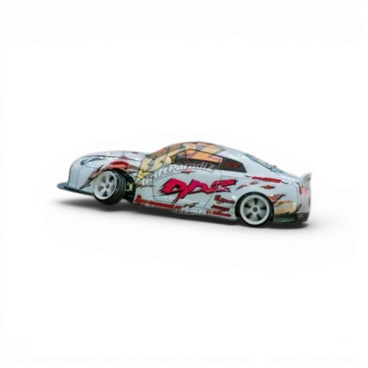Carrosserie de Nissan GTR R35 de la marque Team Yokomo, détaillée et réaliste, pour voitures radiocommandées.