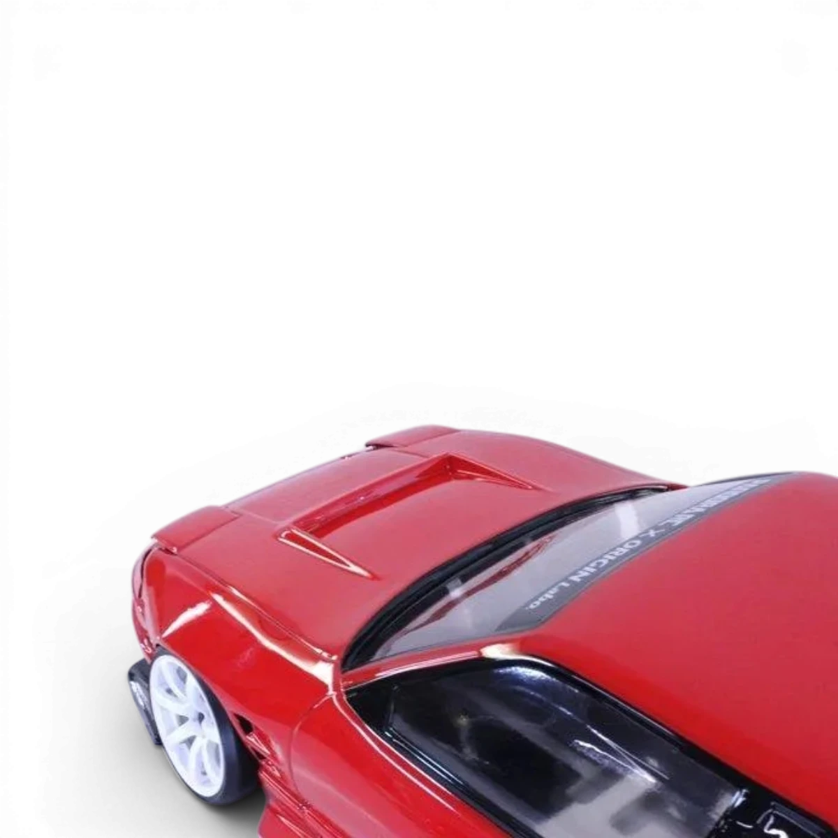 Carrosserie Nissan One-via 240SX Pandora RC, modèle drift, en plastique avec détails réalistes, vue de face.
