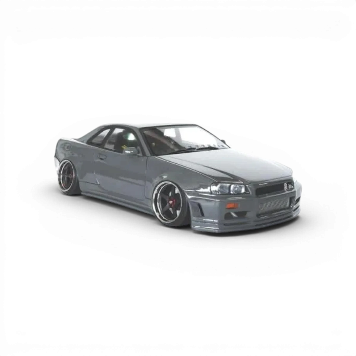 Carrosserie Nissan R34 pour modèle RC, fabriquée par Aplastics RC, avec détails réalistes et finition précise.