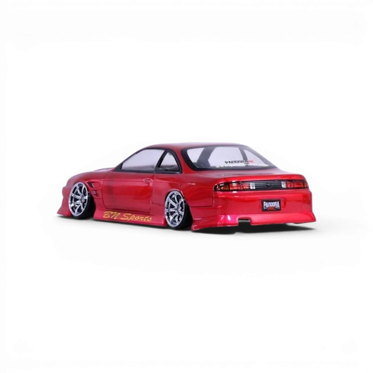 Carrosserie Nissan Silvia S14 tardive de marque Pandora RC avec détails BN SPORTS, peinte en couleur blanche avec éléments de design visibles.