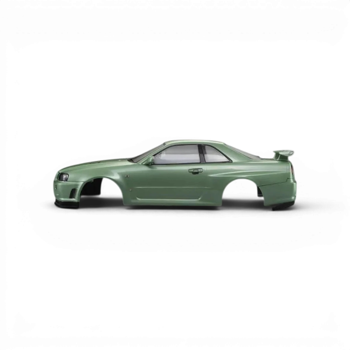 Carrosserie Nissan Skyline R34 GTR vert champagne de la marque Killer Body, détails visibles sur la carrosserie du véhicule.