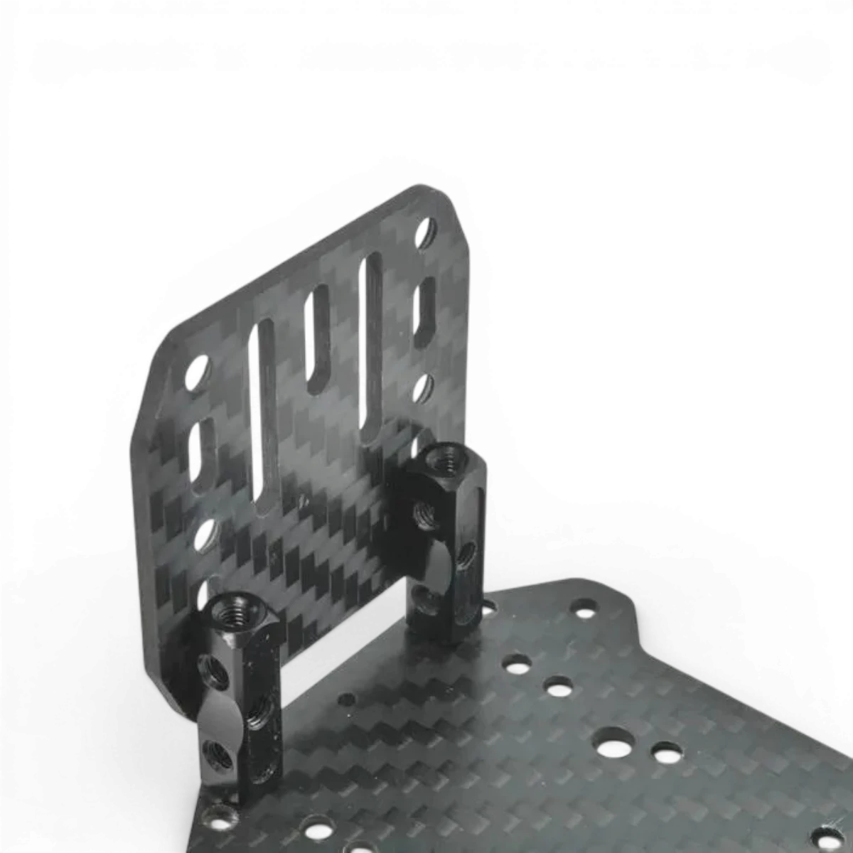 Plaque ESC en carbone et SP Multi Post de Wrap-UP Next, design compact avec éléments en carbone et composants électroniques visibles.