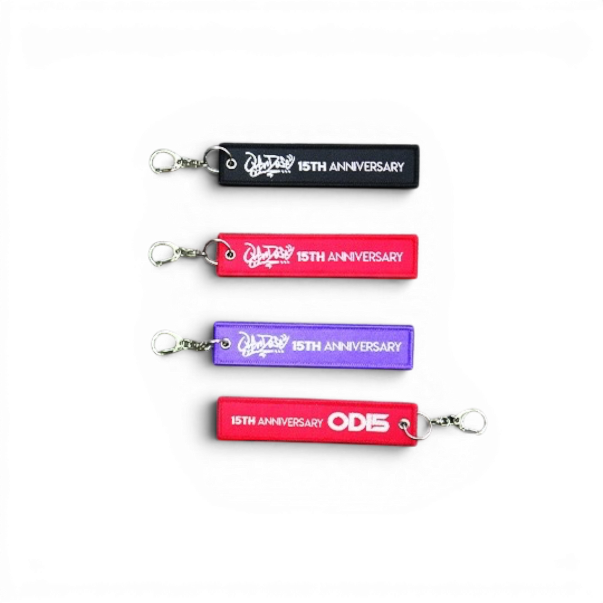Porte-clé Overdose XV 15ème anniversaire, accessoire en métal avec logo Overdose, décoration pour collection ou clés.