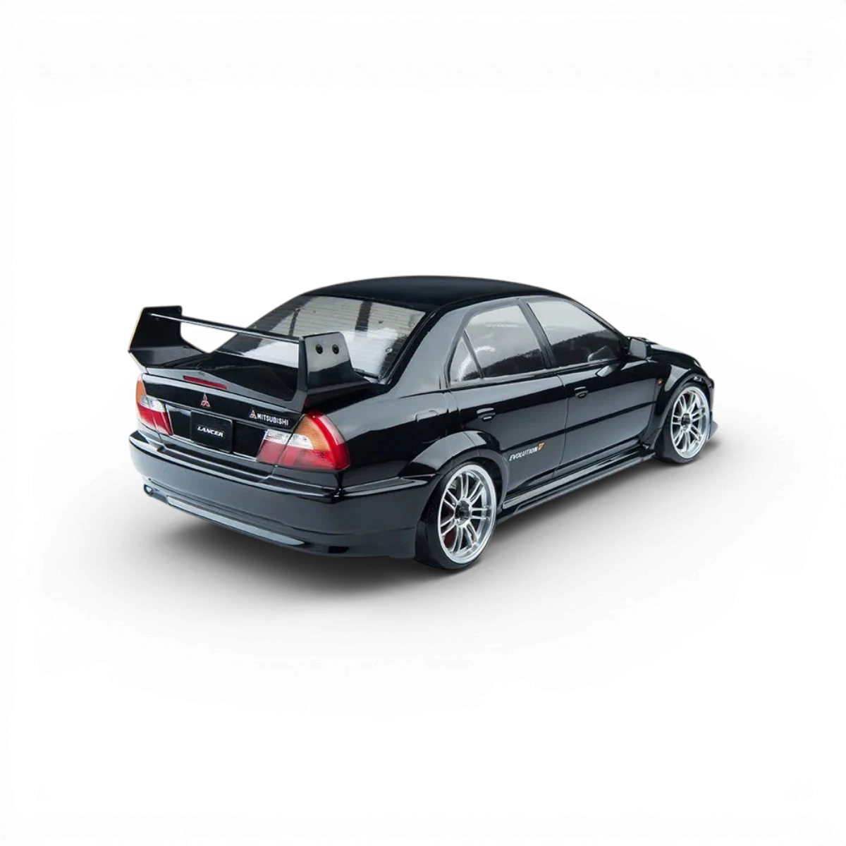Voiture RC drift brushless Max Speed Technology RMX 2.5 RTR Mitsubishi Evo 5 noire, vue de côté sur fond blanc.