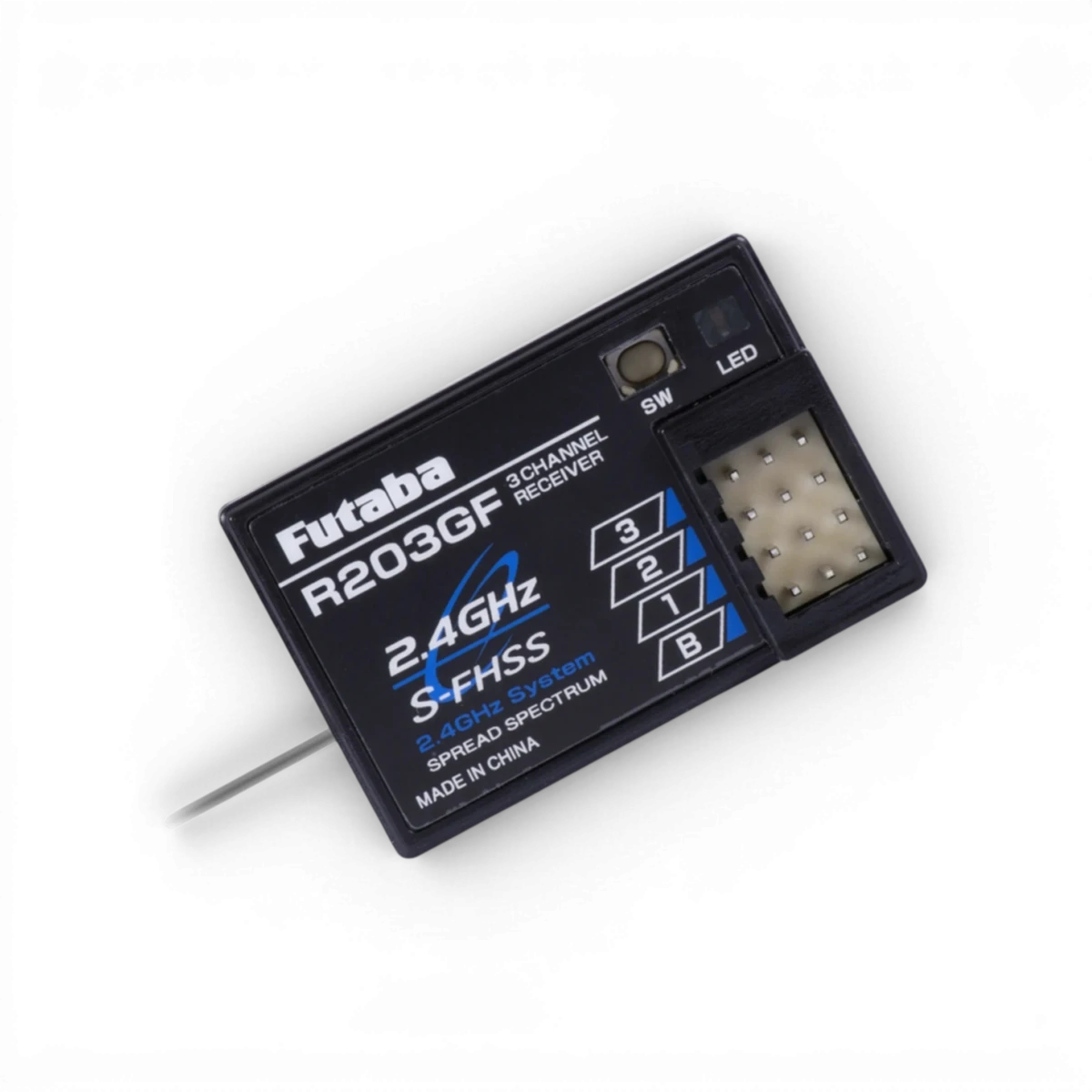 Récepteur Futaba R203GF S-FHSS 3 voies pour radiocommande électronique, vue en gros plan sur l'image.