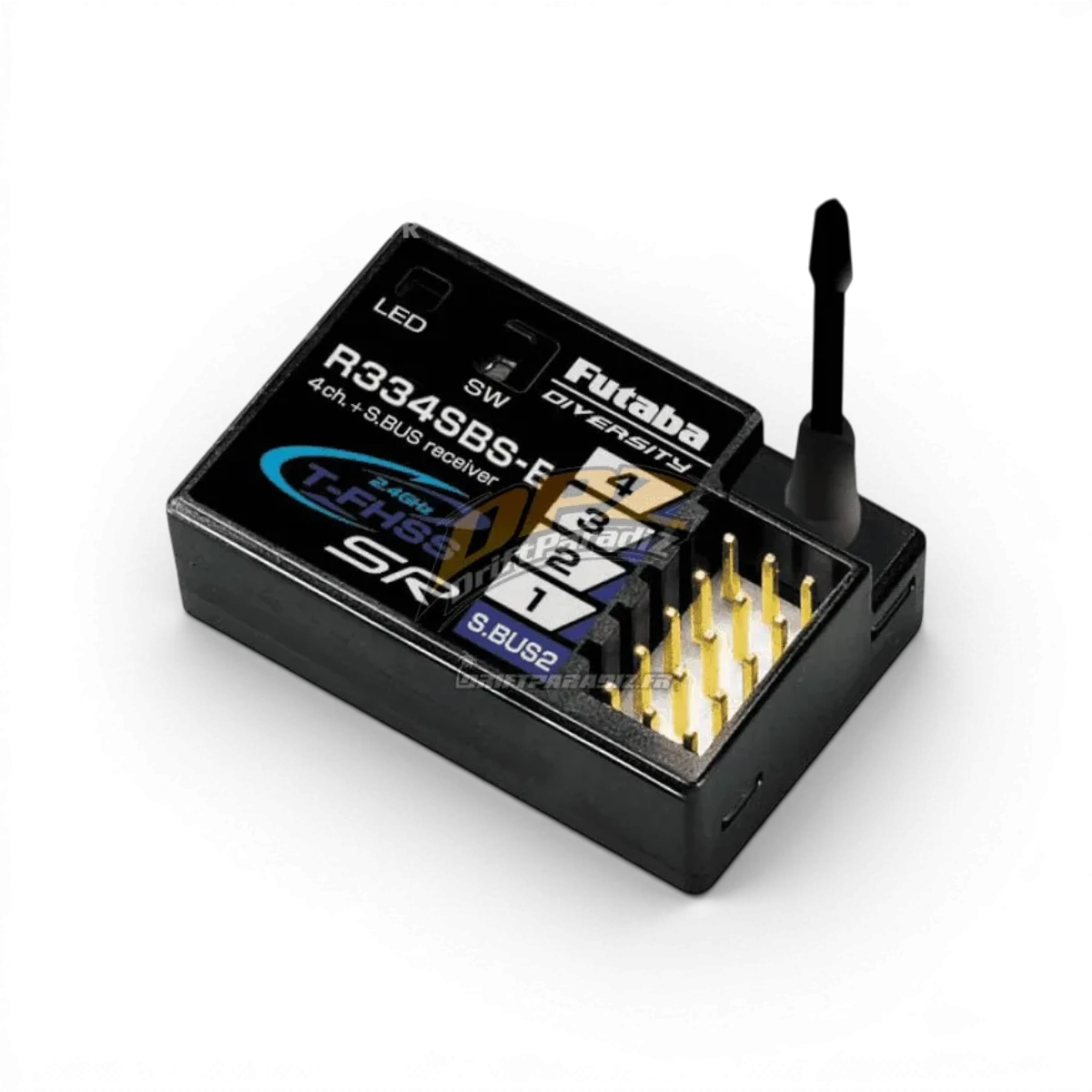 Récepteur Futaba R334SBS-E 2,4 GHz pour électronique, vue en gros plan montrant les connecteurs et la carte électronique
