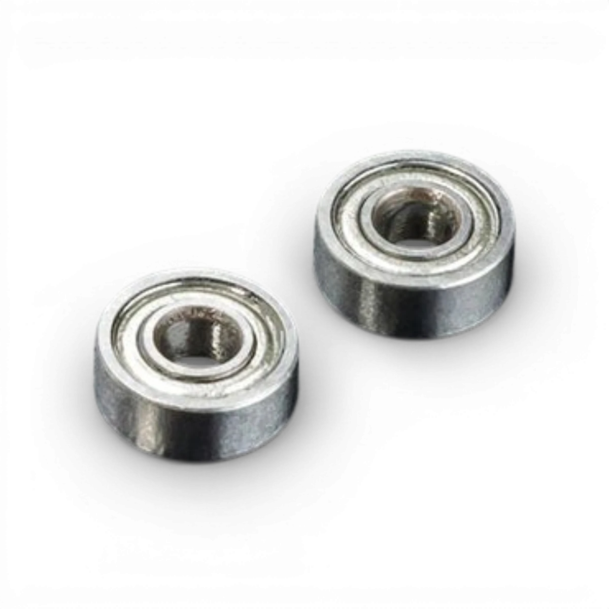 Roulements 3x8x3 Max Speed Technology pour pièces détachées, visibles avec boîtier en métal et rainures de rotation.