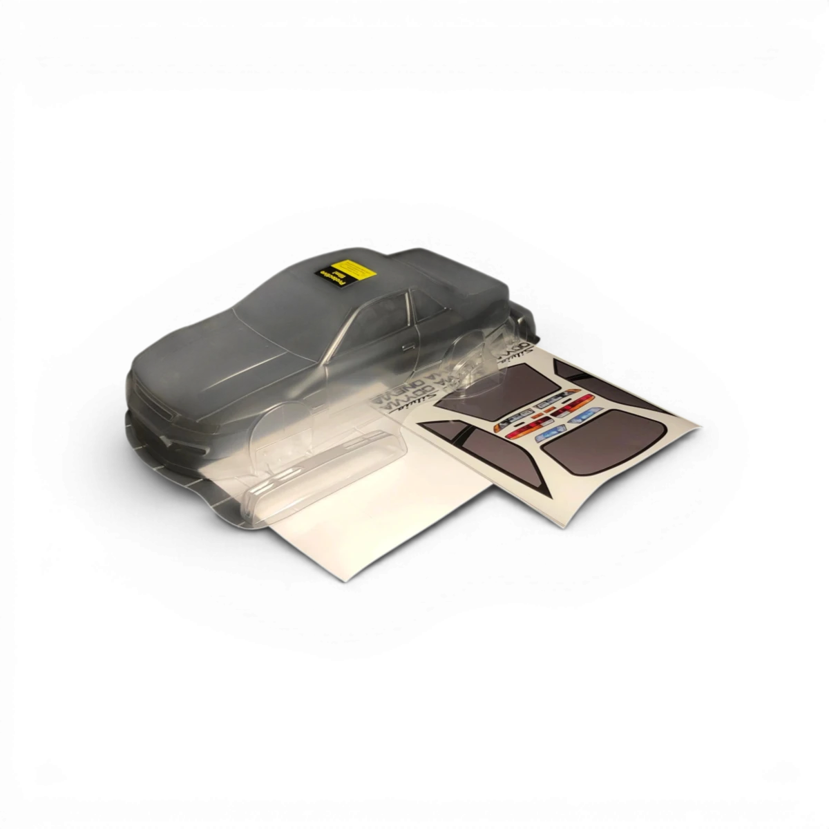 Carrosserie S13 Odyvia de Aplastics RC pour voiture de drift, vue de face avec détails colorés et design aérodynamique.