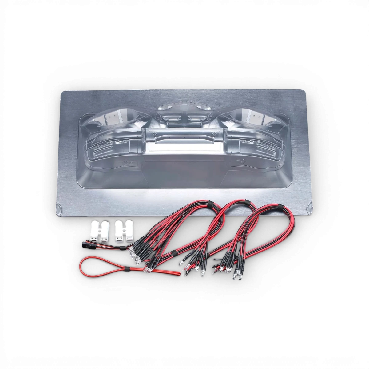 Ensemble de lumières LED pour Nissan Fairlady Z RZ34, kit de customisation rouge et blanc par Team Yokomo, visible sur la voiture.