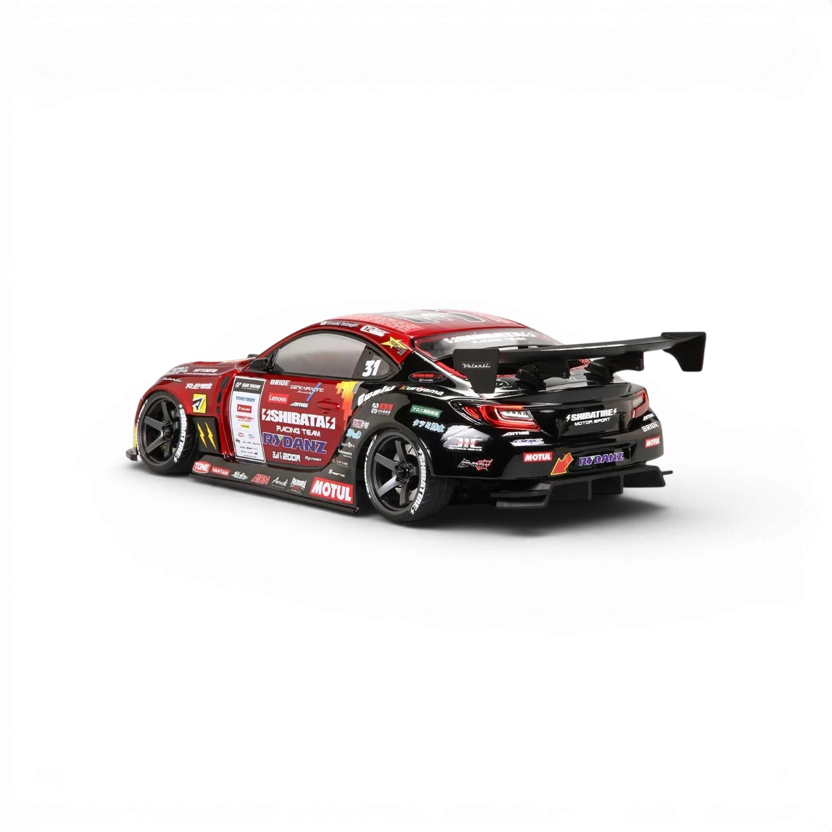 Carrosserie SHIBATA Toyota GR86 avec décoration D1GP, détails de la peinture et design sportif visible dans l'image.