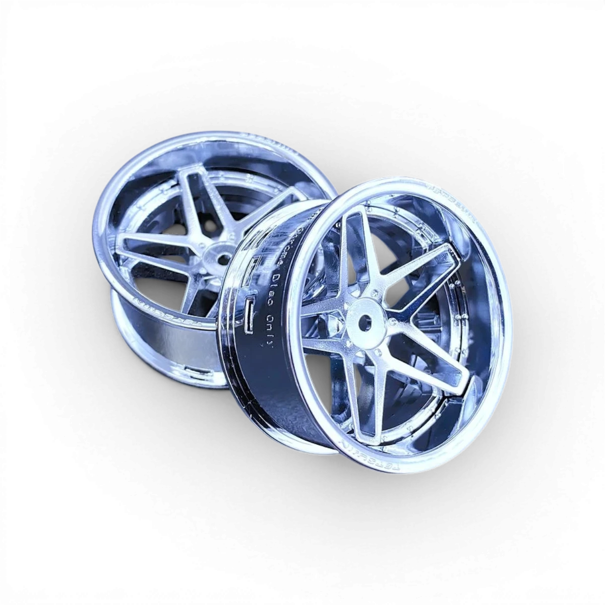 Jeu de roues Tetsujin Souther Cross en chrome, visible avec détails brillants et design robuste, pour voitures de drift.