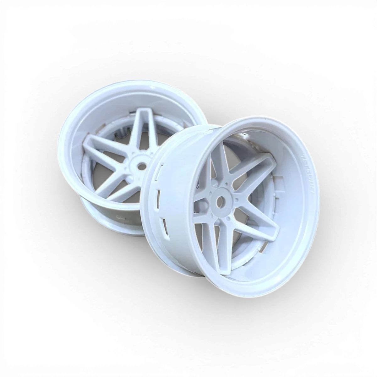 Roues Tetsujin Southern Cross blanc/blanc pour voiture, design élégant et moderne, visibles en gros plan.