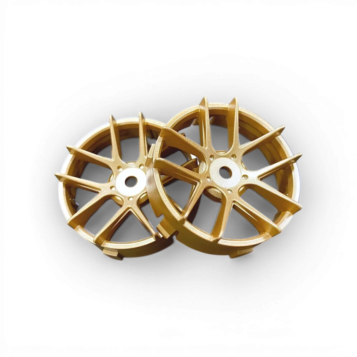 Centre de roue Tetsujin Super RIM Jasmine OR pour véhicules, finition en or, avec détails de design visible.