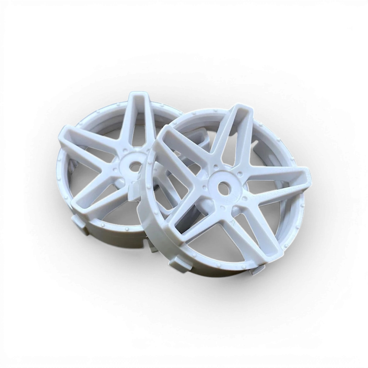 Centre de roue Tetsujin Super RIM Southern Cross blanc, pièce de fixation pour roue de vélo, visible en détail dans l'image.