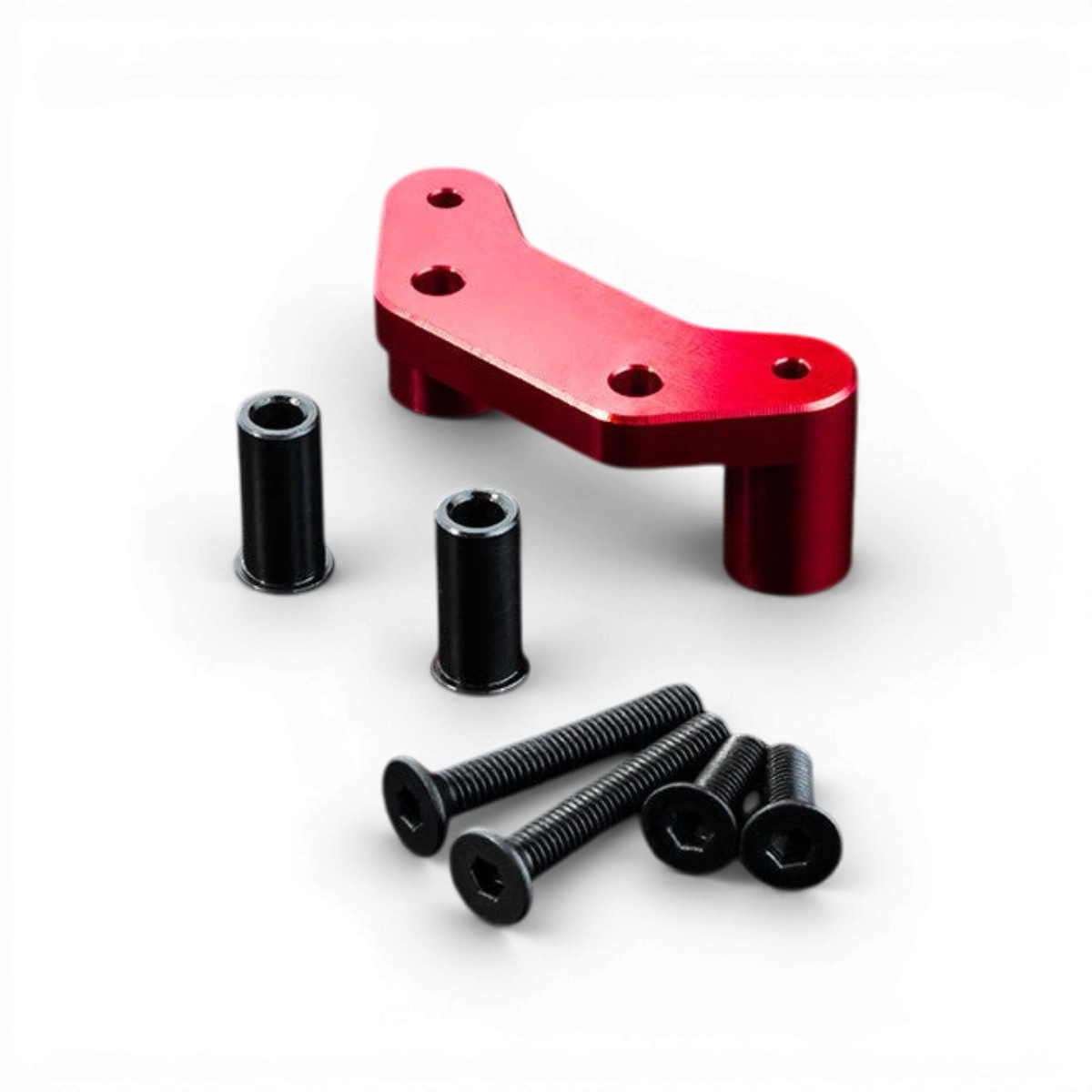 Support de direction en aluminium rouge pour pièces détachées Max Speed Technology, visible avec fixation robuste.