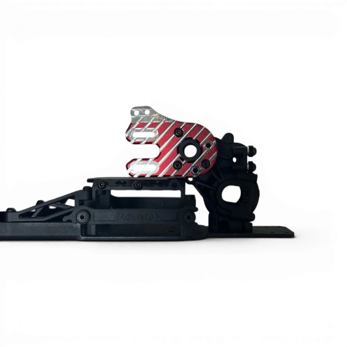 Support moteur en aluminium RDX pour moteur 380, conçu par Addiction RC Design, visible avec fixation solide et finition métallique.