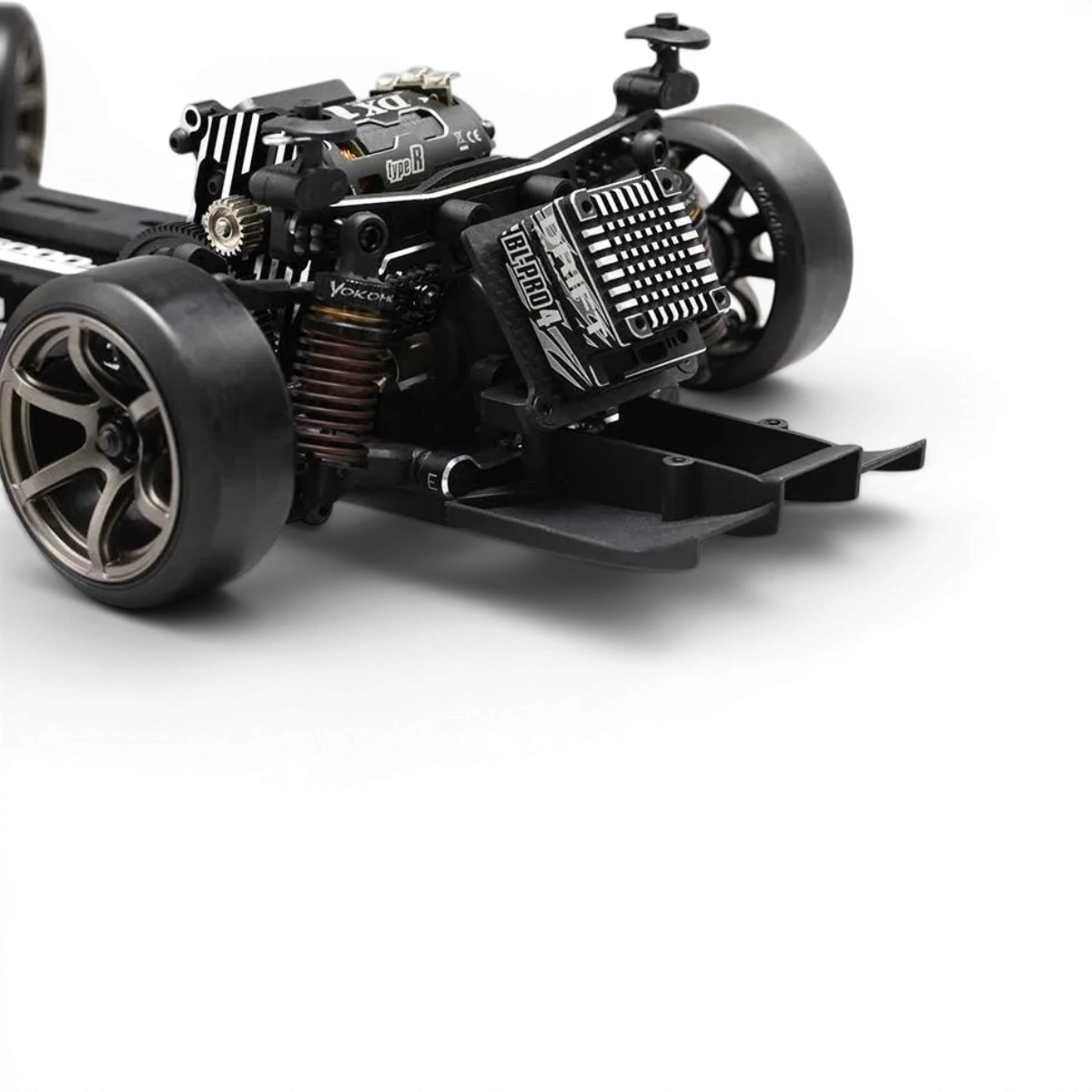 Support pour variateur YD2 Series de Team Yokomo, pièce détachée pour modèle RC, en plastique noir avec fixation métallique.