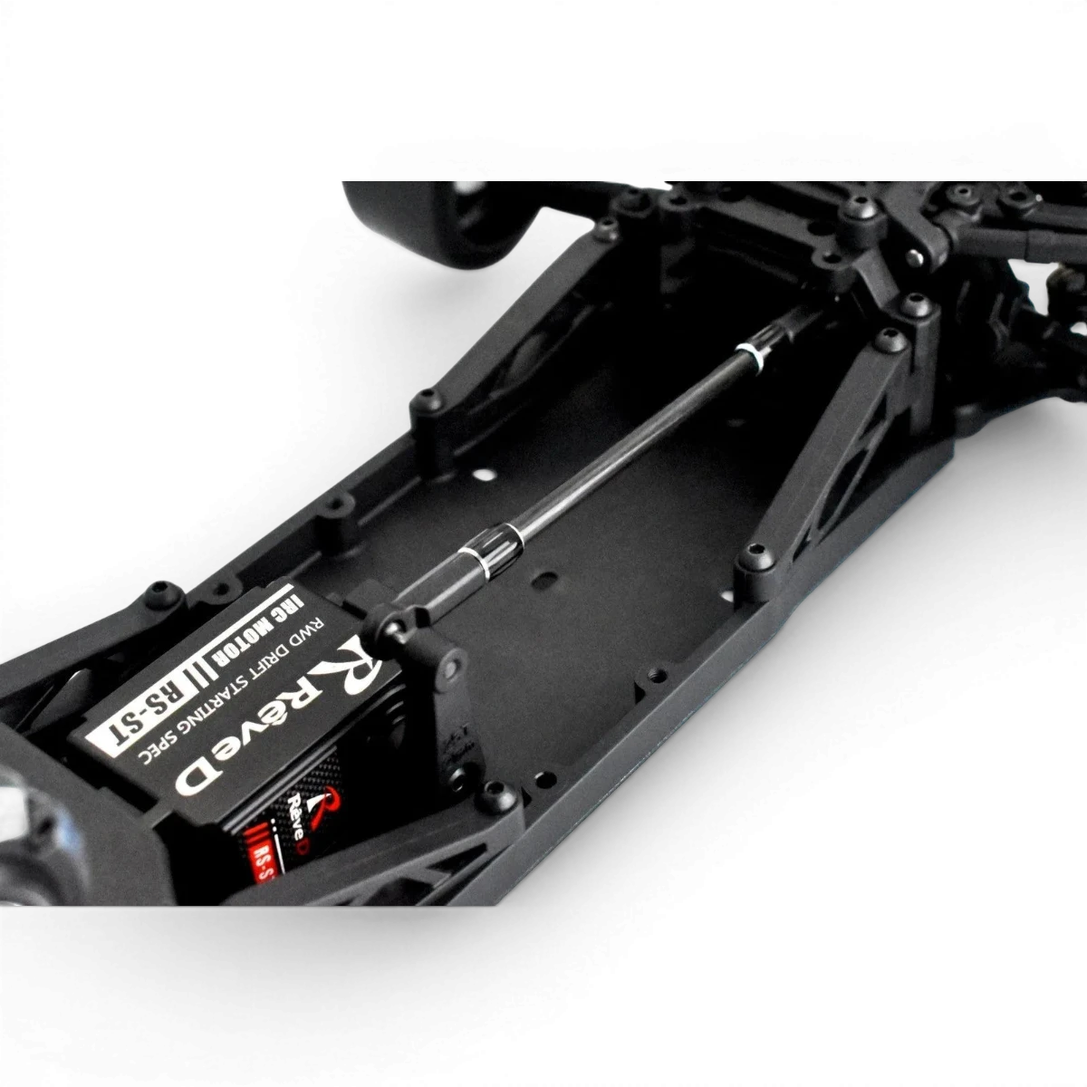 Tige servo en carbone RDX de Team Reve D, légère et résistante, pour voiture RC, vue en gros plan.