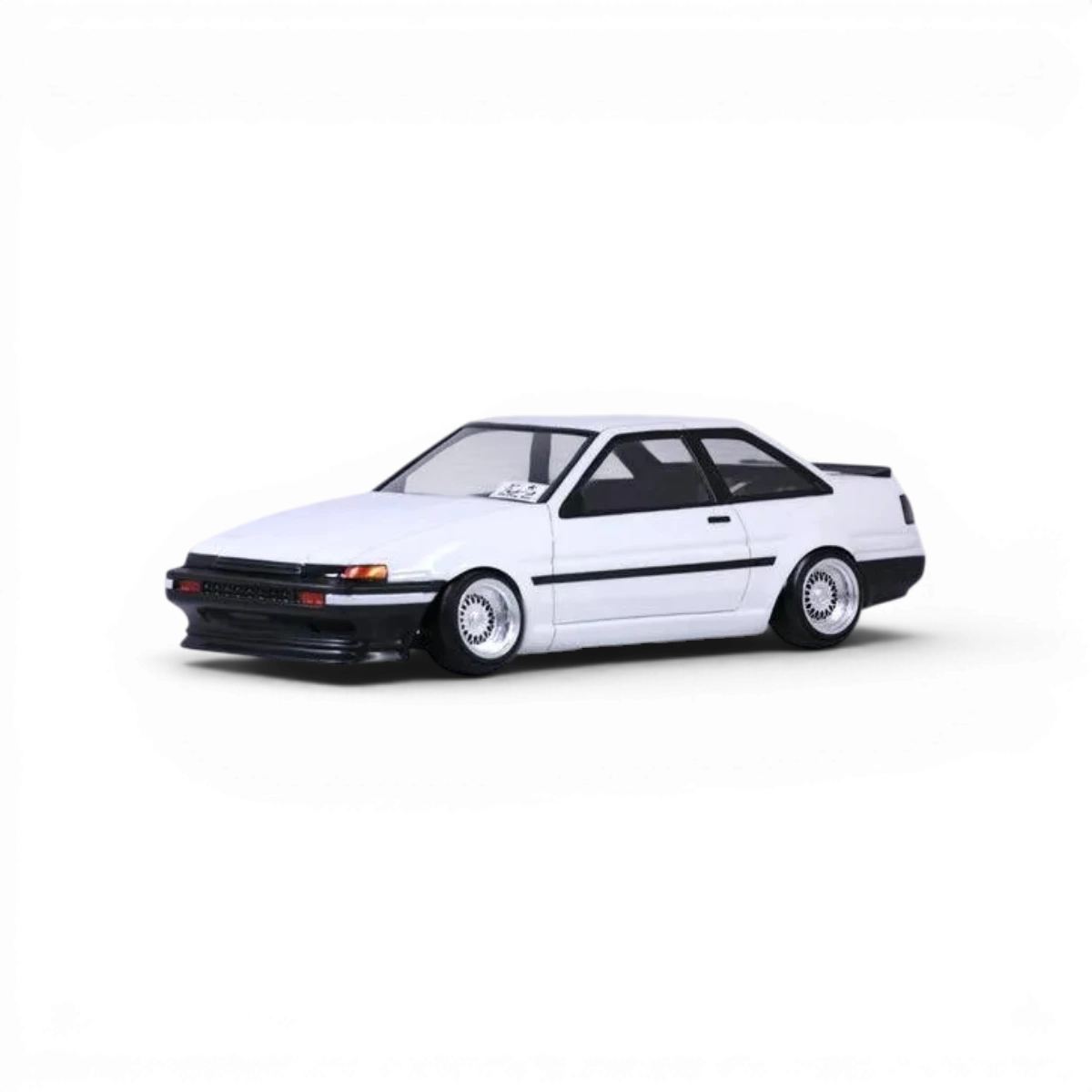Voiture toyota AE86 Trueno 2 portes en carrosserie, modèle réduit Pandora RC, vue de face sur fond blanc.