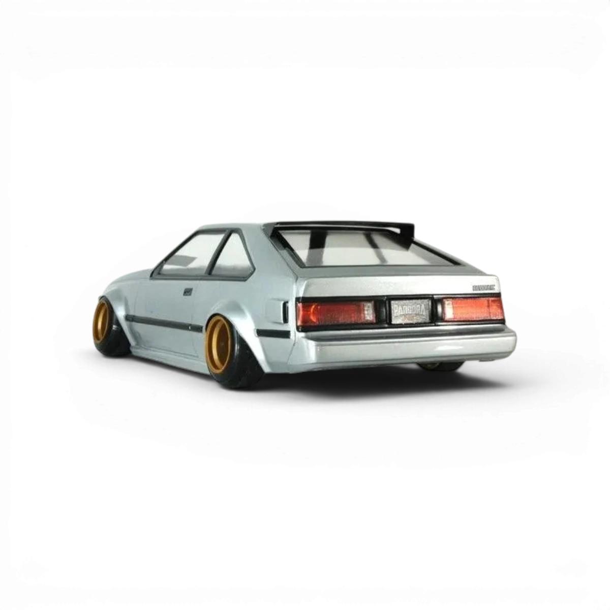 Carrosserie pour Toyota Celica XX A60, modèle Pandora RC, avec détails réalistes pour voiture télécommandée.