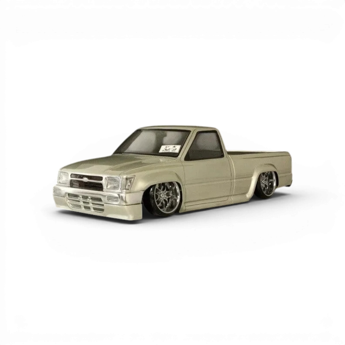 Carrosserie pour Toyota Hilux RN80 Pandora RC, finition détaillée, en plastique robuste, vue de face avec détails du véhicule.