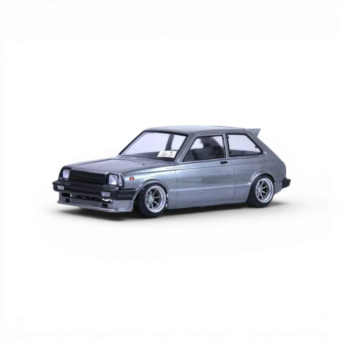Voiture radiocommandée Toyota Starlet KP61 tardif de Pandora RC, carrosserie détaillée pour drift et modélisme automobile.
