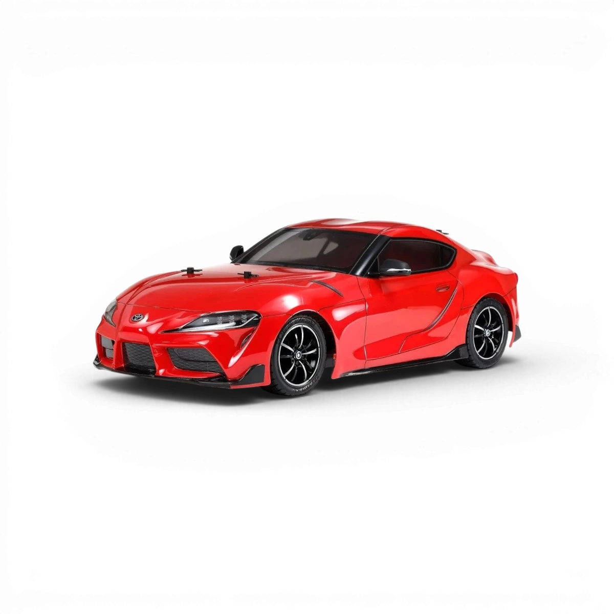 Modèle de carrosserie Toyota Supra Tamiya, détails précis et finition réaliste sur cette pièce de voiture miniature.