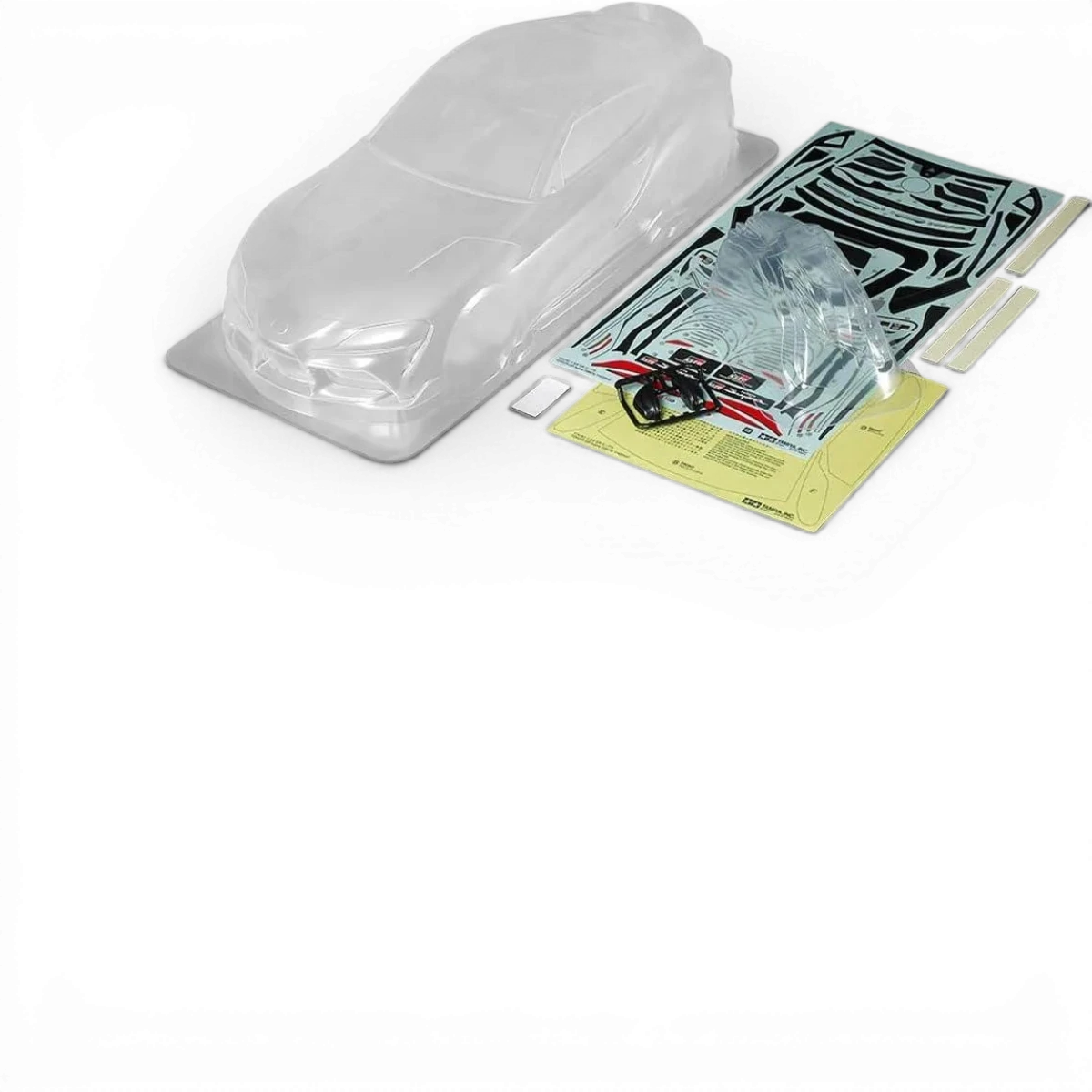 Modèle de carrosserie Toyota Supra Tamiya, vue détaillée montrant la peinture et la finition du véhicule.