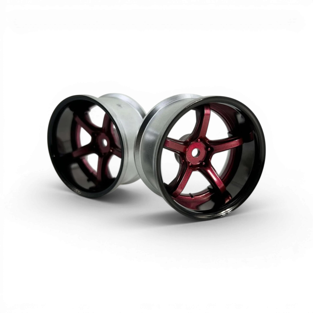 Roues Work Emotion T5R Offset 8 en rouge candy et noir, montées sur un véhicule, avec design sport et finition brillante.
