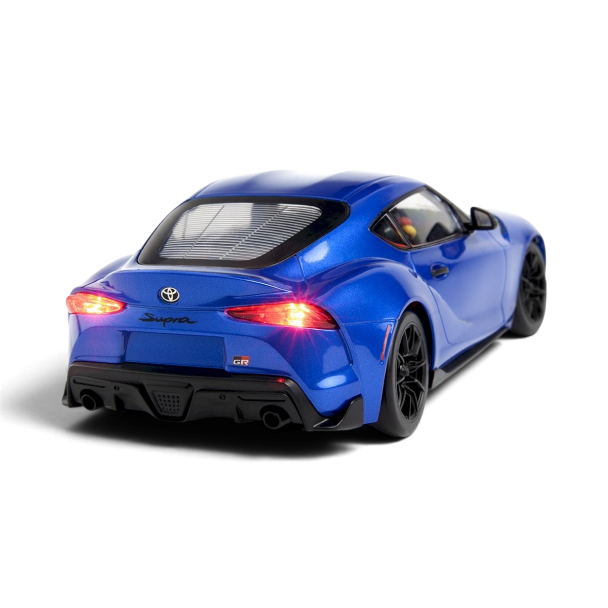 Achteraanzicht van de RC-auto DriftParadiZ Toyota GR Supra 2024 metallic blauw met ingeschakelde LED-achterlichten
