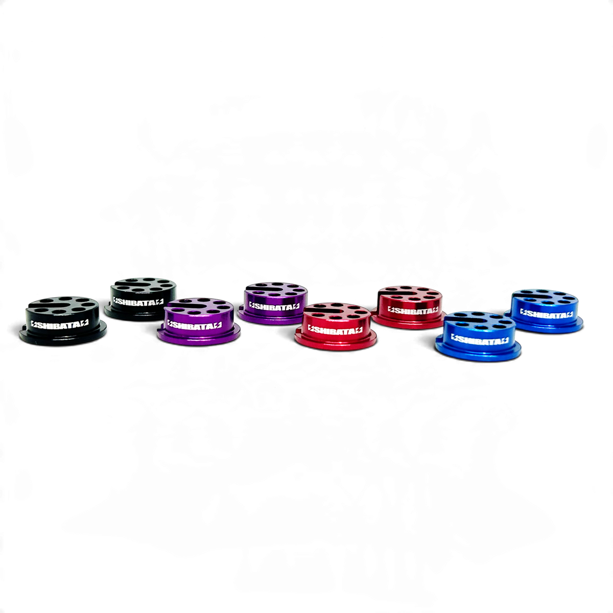 Supports de ressort en aluminium DriftParadiZ pour amortisseurs GRK, disponibles en noir, violet, rouge et bleu.