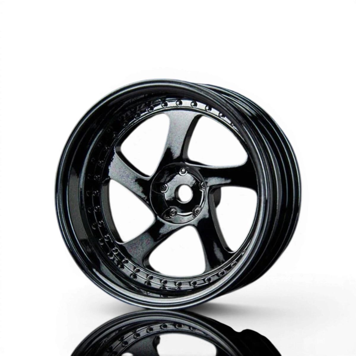 Roues TMB Max Speed Technology en chrome et noir, design élégant avec jantes de 11 pouces, visibles sur l'image.