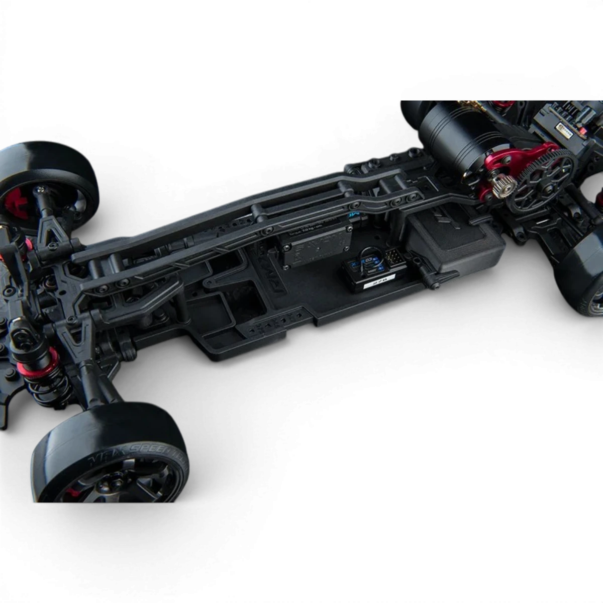 Châssis de drift RC Max Speed Technology RMX 4 Classic Kit, vue de face avec composants et pneus de drift.