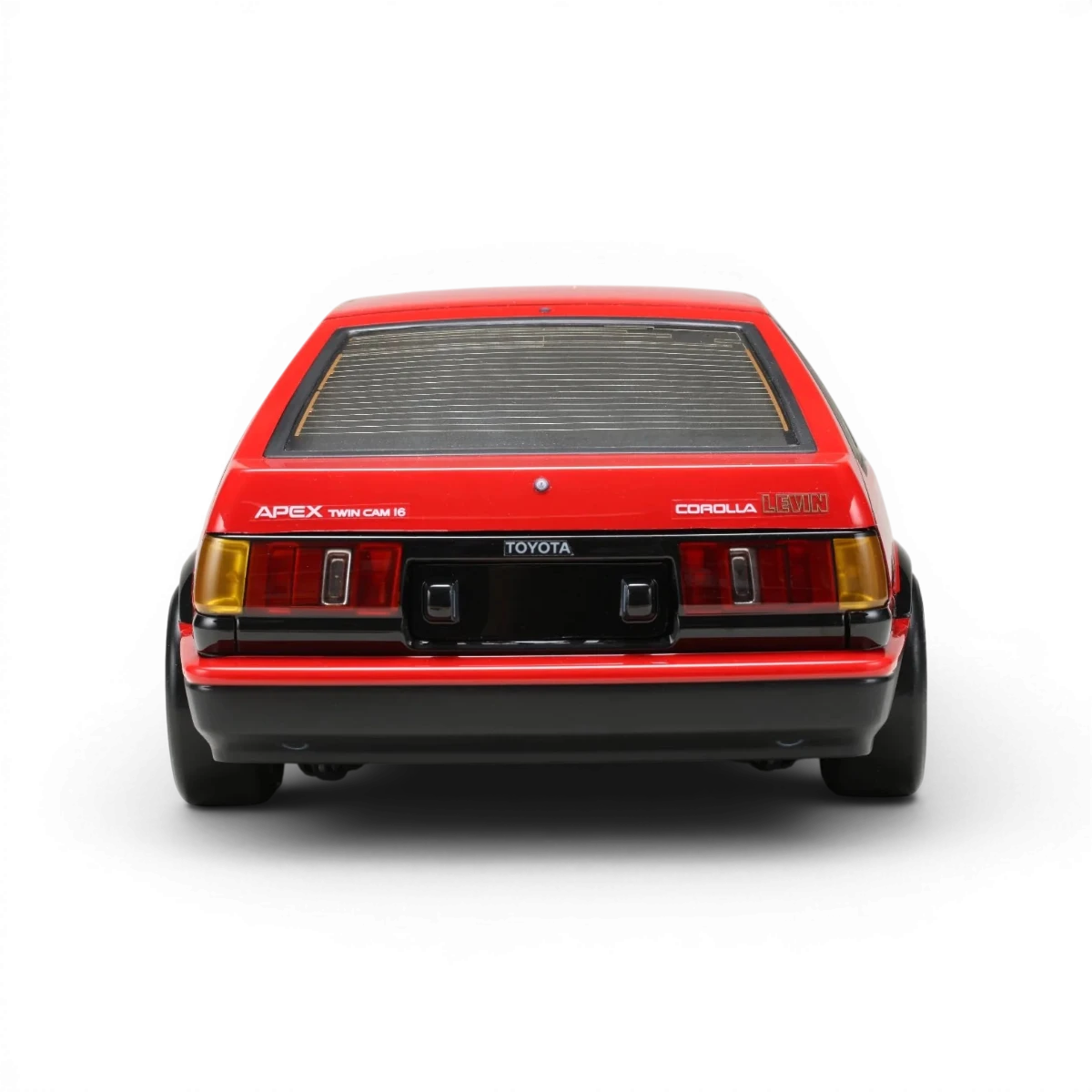 Carrosserie Toyota AE86 Levin L3 de Team Yokomo, vue en gros plan avec détails colorés et finition soignée.