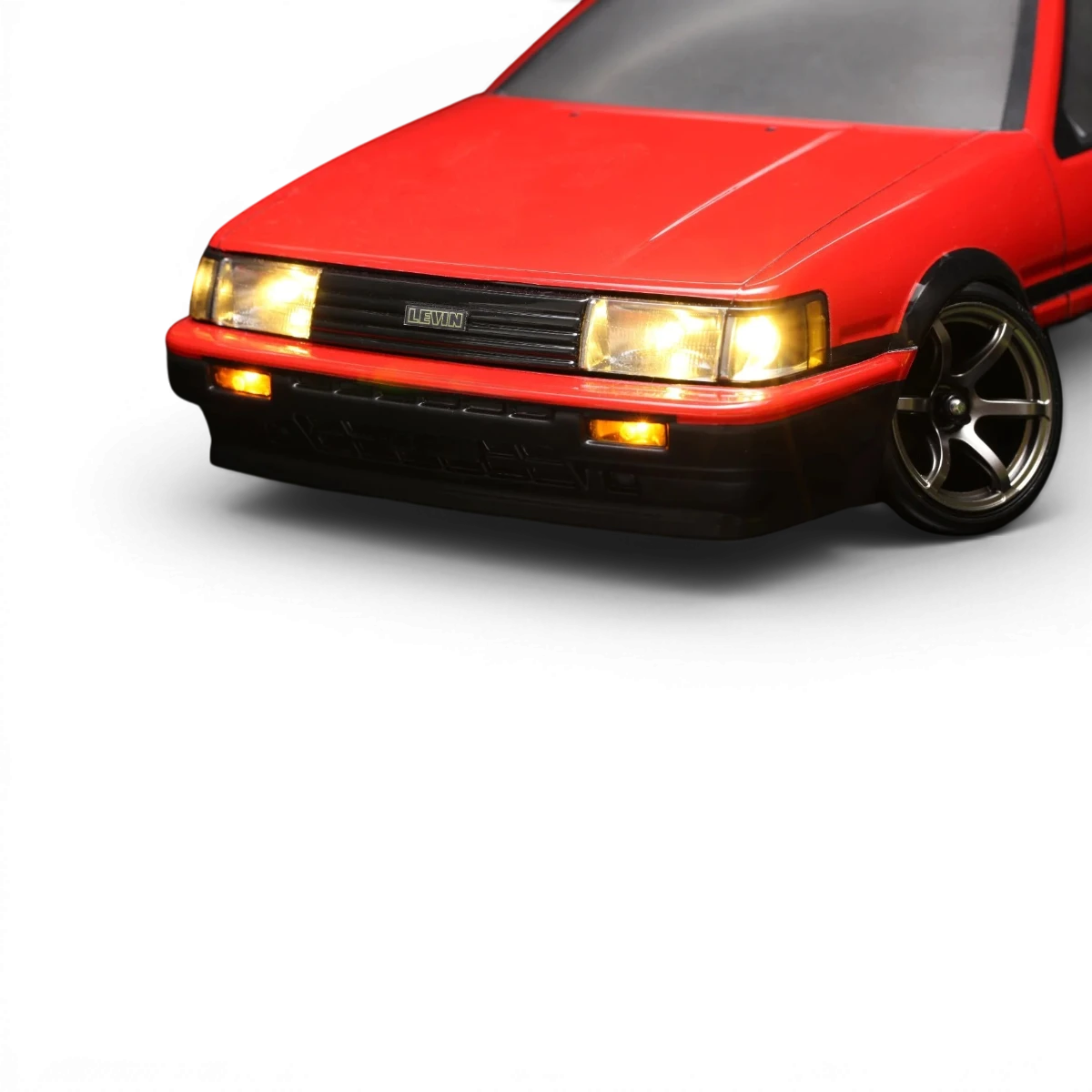 Kit LED pour Toyota AE86 Levin 3 portes, personnalisé par Team Yokomo, avec lumières LED visibles sur la voiture.