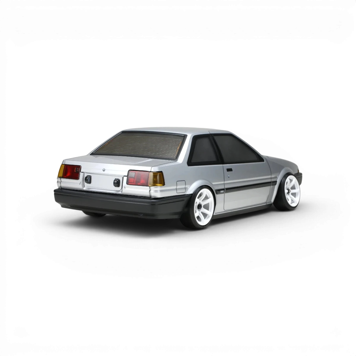 Carrosserie Toyota AE86 Trueno T2 de la marque Team Yokomo, vue en gros plan avec détails de la carrosserie.