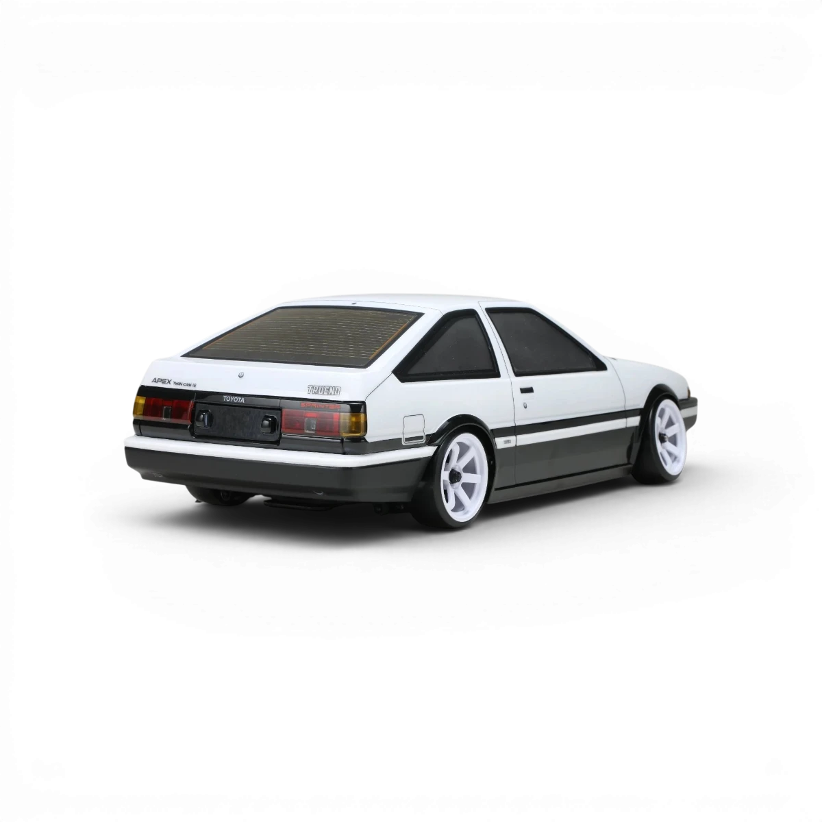 Carrosserie Toyota AE86 Trueno T3 de Team Yokomo, vue de face avec détails de la carrosserie pour voiture RC.