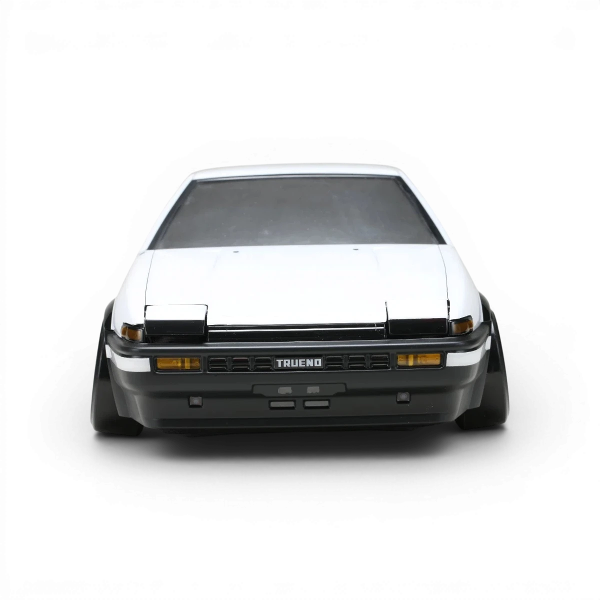 Carrosserie Toyota AE86 Trueno T3 de Team Yokomo, finition détaillée, vue de face avec éléments de carrosserie et design réaliste.