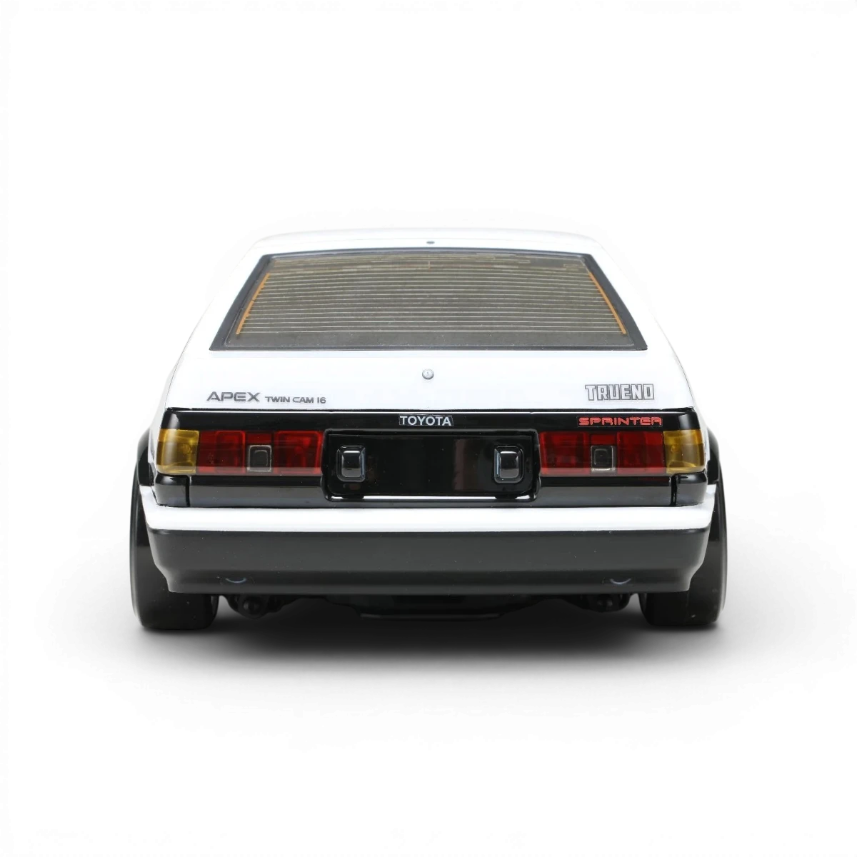 Carrosserie Toyota AE86 Trueno T3 de la marque Team Yokomo, vue de côté avec détails de la carrosserie en plastique.