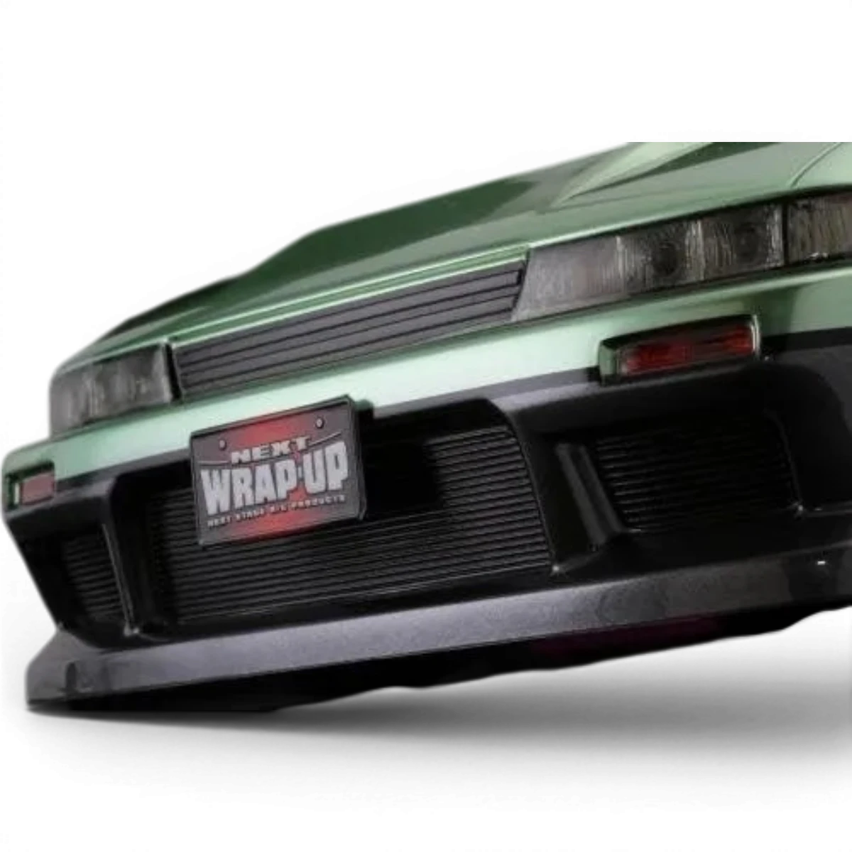 Autocollants REAL 3D Detail Up pour Yokomo Silvia S13, style carré, marque Wrap-UP next, visible sur le véhicule.