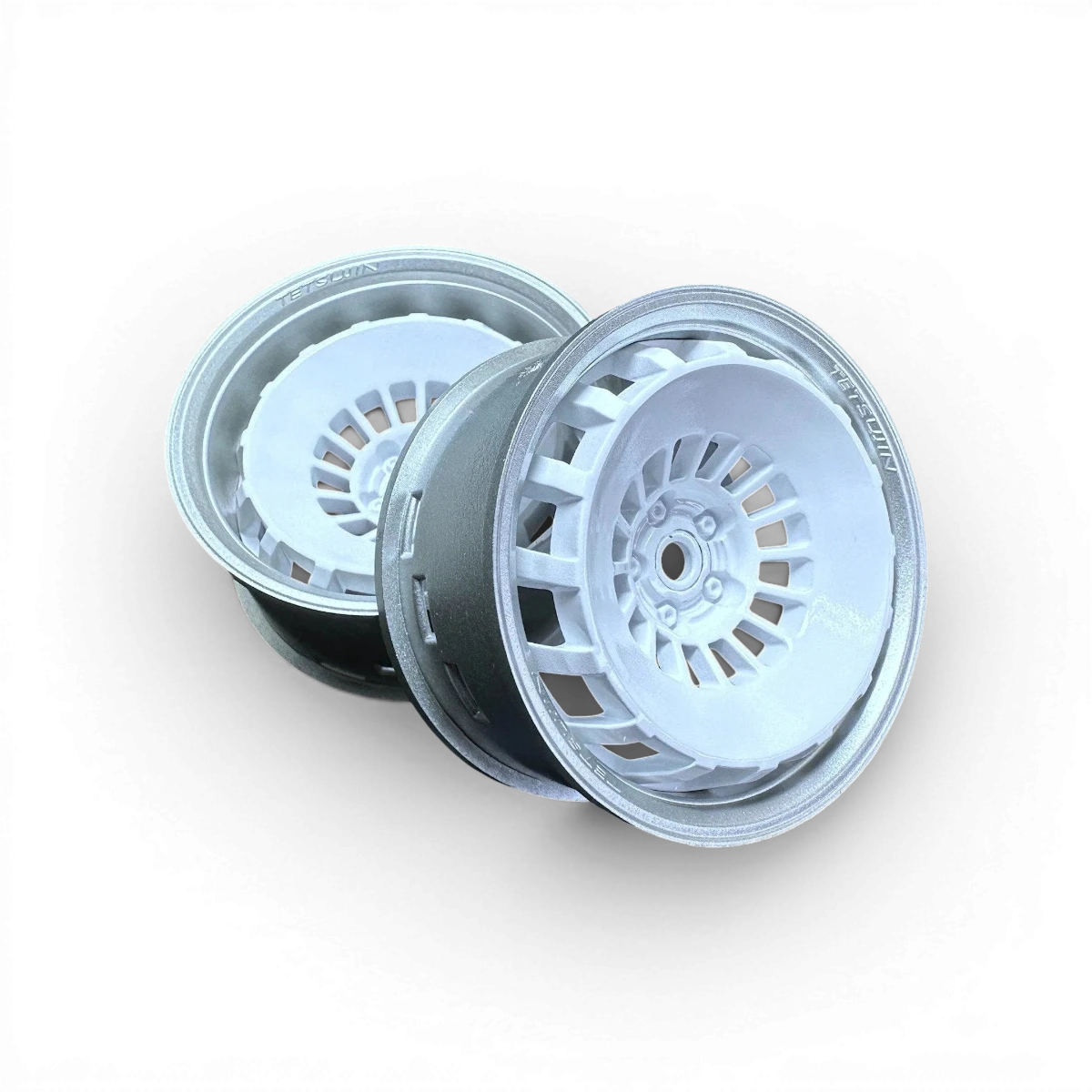 Roues Tetsujin Bowler Gris et Blanc, ensemble de roues pour skateboard ou cruiser, avec détails de finition et design moderne.