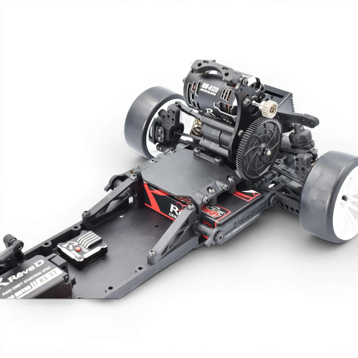 Châssis drift RDX Team Reve D, robuste et léger, conçu pour la performance en drift, avec détails visibles en noir et rouge.