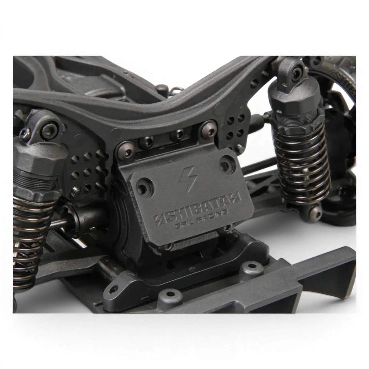 Châssis RC Drift SHIBATA GRK GS2 Modifié pour voiture télécommandée, vue de face avec détails de la structure métallique et composants.