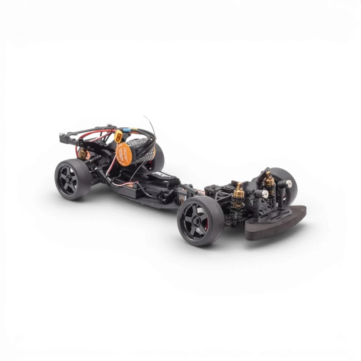 Châssis RC drift HOBBYTECH OVER-D10 RTR Brushless RWD, vue de face montrant le châssis robuste et les composants de drift.