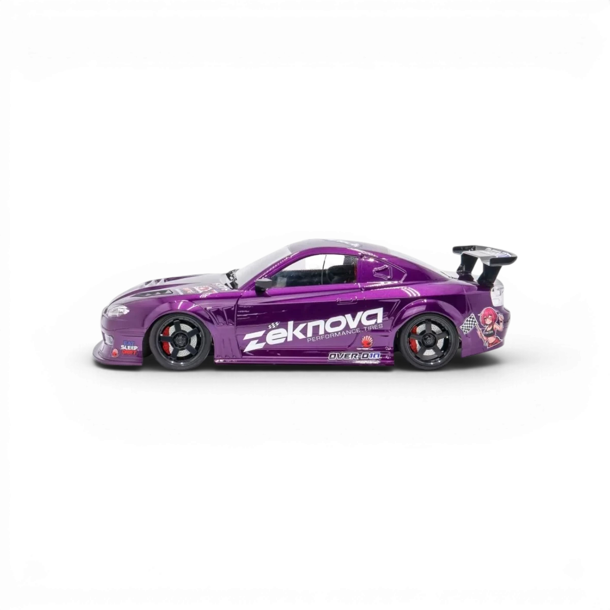 Châssis RC drift HOBBYTECH OVER-D10 RTR Brushless RWD, vue de face montrant le châssis robuste et les composants électroniques.
